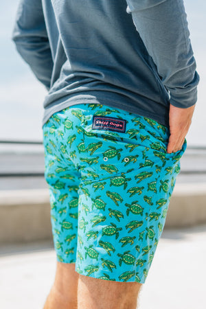 
                  
                    Load image into Gallery viewer, Turtle Tour: Swim Trunks - Turquoise
                  
                
